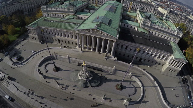 Camera flying above Austrian Parliament in Vienna.