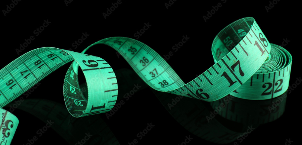 Canvas Prints Measuring tape on black background