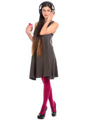 young woman listening to music on mobile phone