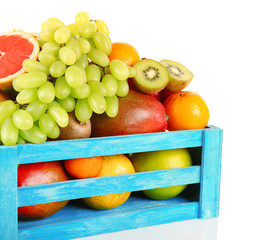 Assortment of fruits in box isolated on white