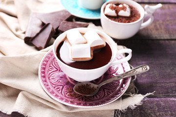 Hot chocolate with marshmallows in mug,