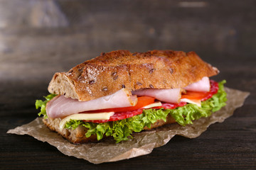 Fresh and tasty sandwich with ham and vegetables