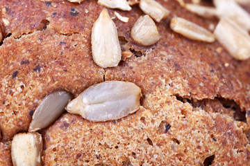 Bread with sunflower seeds texture close up