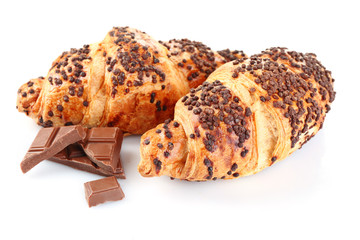 Fresh and tasty croissants with chocolate, isolated on white