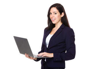 Businesswoman use of notebook computer