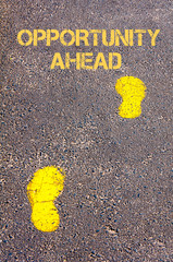 Yellow footsteps on sidewalk towards Opportunity Ahead message