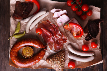 Assortment of deli meats on parchment, closeup