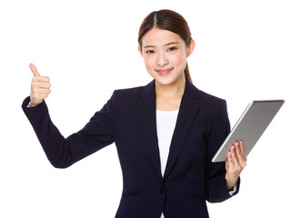 Businesswoman use of tablet and thumb up