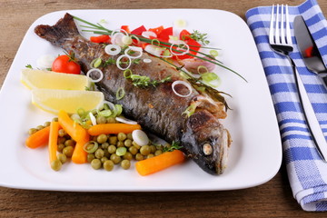 Grilled trout with tasty vegetables