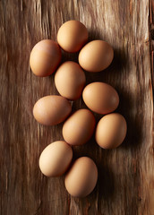 Brown Eggs On Wood