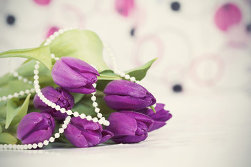 Obraz na płótnie Canvas Vintage photo of purple tulip flowers
