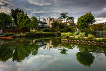 Fototapeta na wymiar Houses along a canal in Venice Beach, Los Angeles, California.