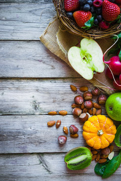 Fruits and vegetables on rustic background