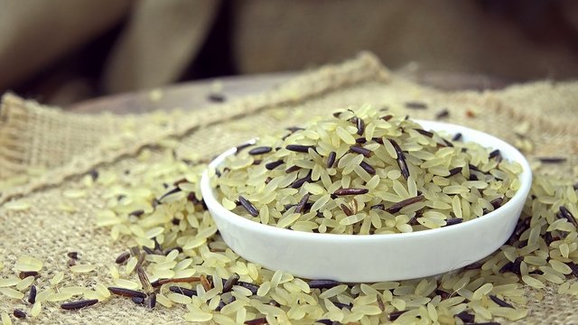 Portion of mixed Rice (seamless loopable 4K footage)