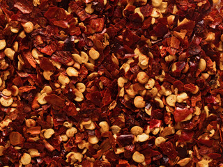 dried red chili flake food background