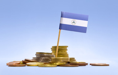 Flag of Nicaragua in a stack of coins.(series)