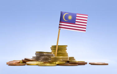 Flag of Malaysia in a stack of coins.(series)