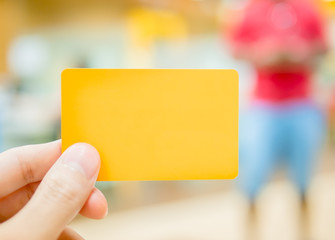 Hand holding card