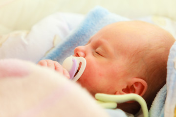 Little newborn baby girl 24 days sleeps