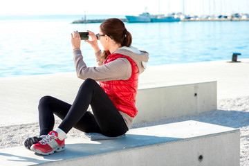 Sport woman on the promenade