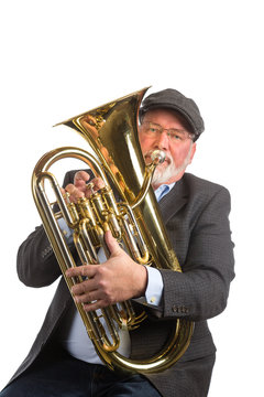 A man wearing a hat and blazer playing an Euphonium, Tenor Tuba, isolated on a white background