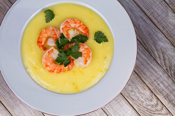 Fennel and potato cream soup with shrimps