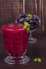 Frozen black currant berries smoothie with mint