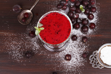 Frozen black currant berries smoothie with mint