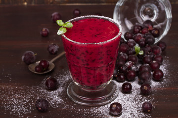Frozen black currant berries smoothie with mint