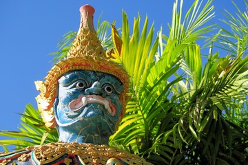 Standing Buddhist Gnome statue in Northern Thailand