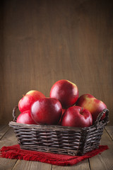 Fototapeta na wymiar Red apples in basket