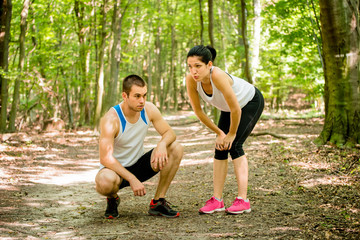 Couple relaxes after jogging