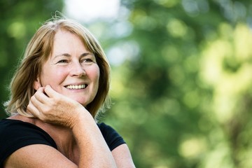 Smiling mature woman outdoor portrait