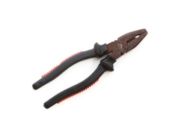 Old pliers isolated on white background