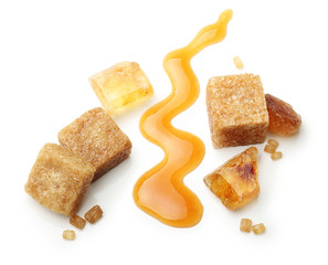 Brown cane sugar cubes and caramel