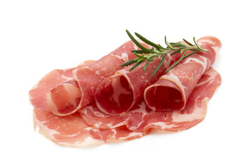 Dried pig meat slices. Delicatess.