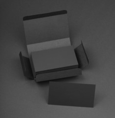 Gray business cards in the gray box.