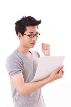 successful smart nerd or geek student man looking at the documen