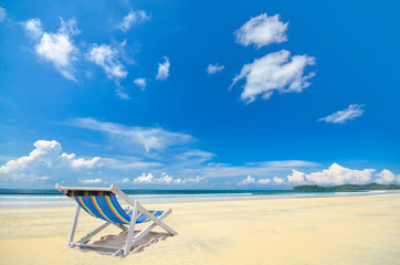 Chair under blue cloudy sky at koh Payam , Ranong , Thailand