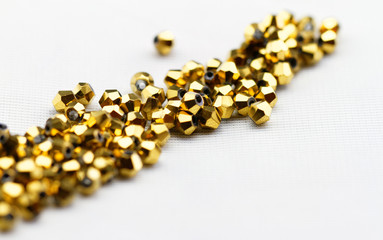 Golden glass beads