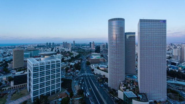 Tel Aviv Skyline From Day And Night,  Time Lapse
 Aerial View - Azrieli Center and Traffic Time Lapse