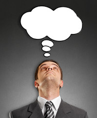Businessman Looking Upwards With Speech Bubble