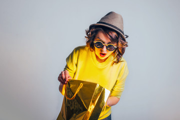 women open bag with surprise