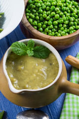 Fresh dieting garden peas and mint soup from above