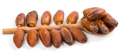 Date dried fruits in a spoon