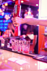 Barman making cocktail