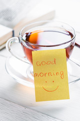 good morning with smile and cup tea