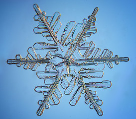 snowflake crystal blue background