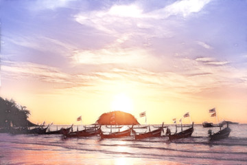 Fototapeta na wymiar boat sunset thailand beach landscape