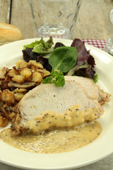 rôti de porc et pommes de terre